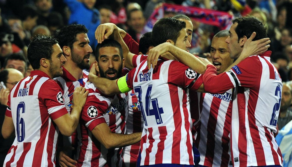 jugadores Atletico celebrando un gol